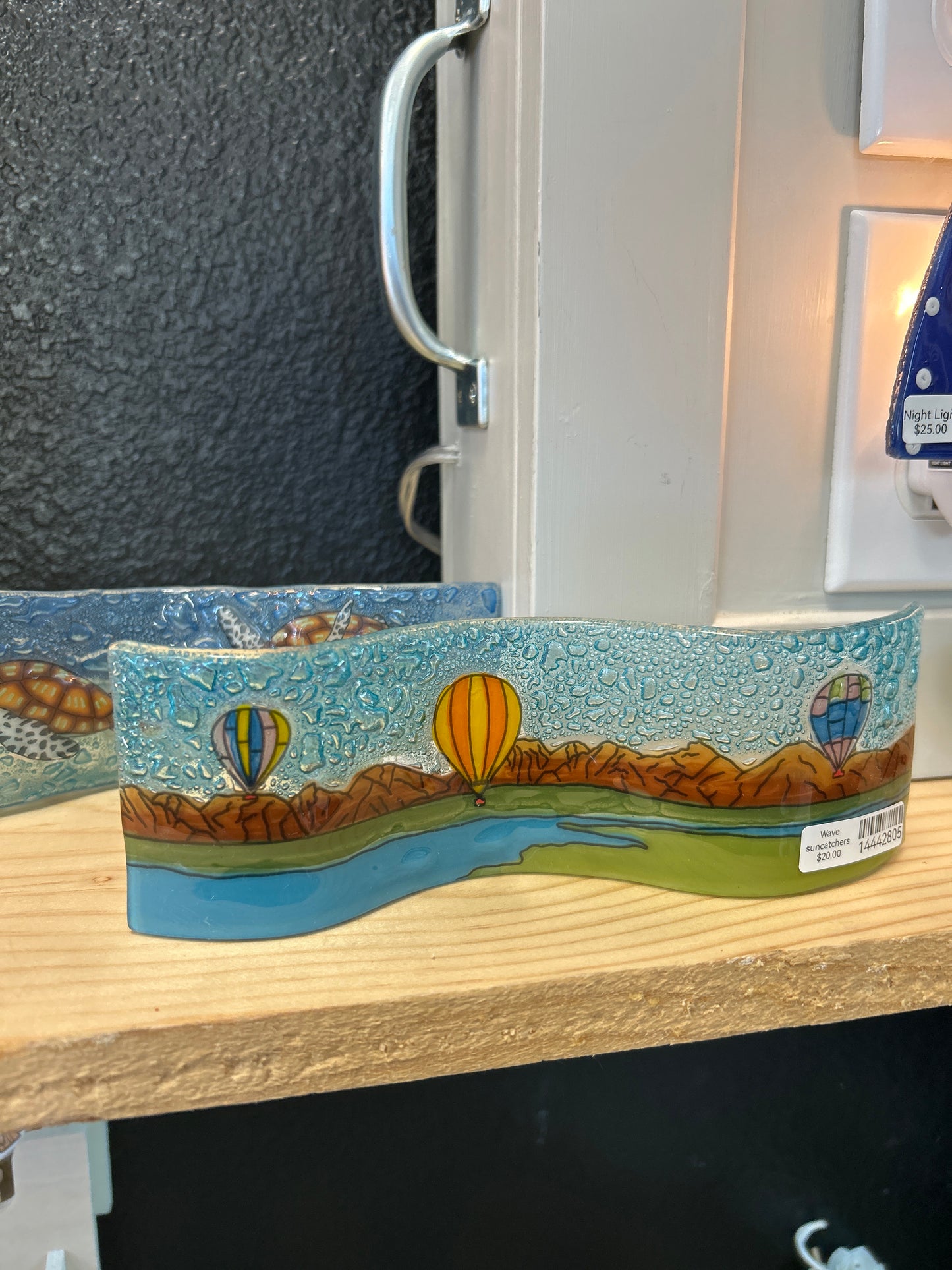 Wave standing suncatcher